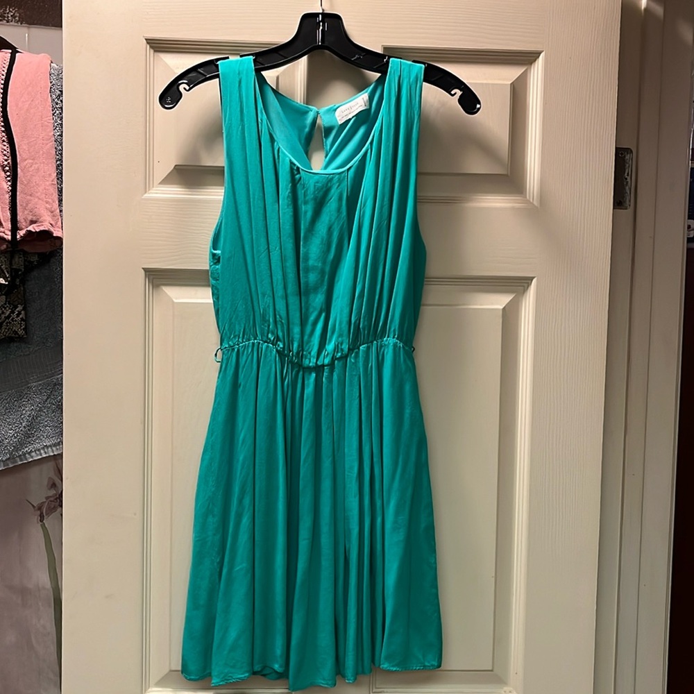 Love Tree turquoise blue dress feels like silk and is lined great for summer